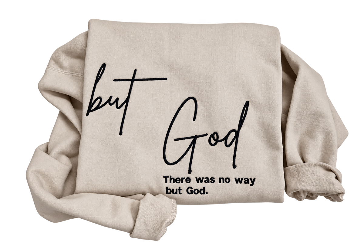 Sand But God embroidered sweatshirt with black script and There was no way but God message