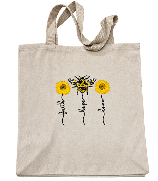 Faith Hope Love embroidered beige tote with yellow sunflowers and a bee