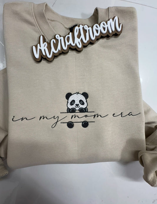 Sand-colored In My Mom Era embroidered sweatshirt with a black-and-white panda